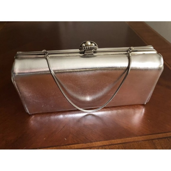 Chic Black Wristlet with Sleek Design and Metallic Accents - Picture 1 of 16